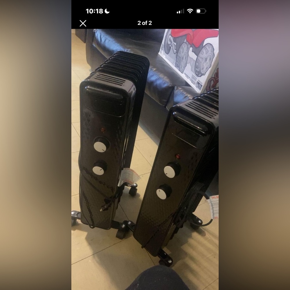 2 black mainstay electric heaters